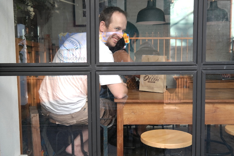Adam, seorang teman yang memberi tahu keberadaan kedai kopi mini ini
